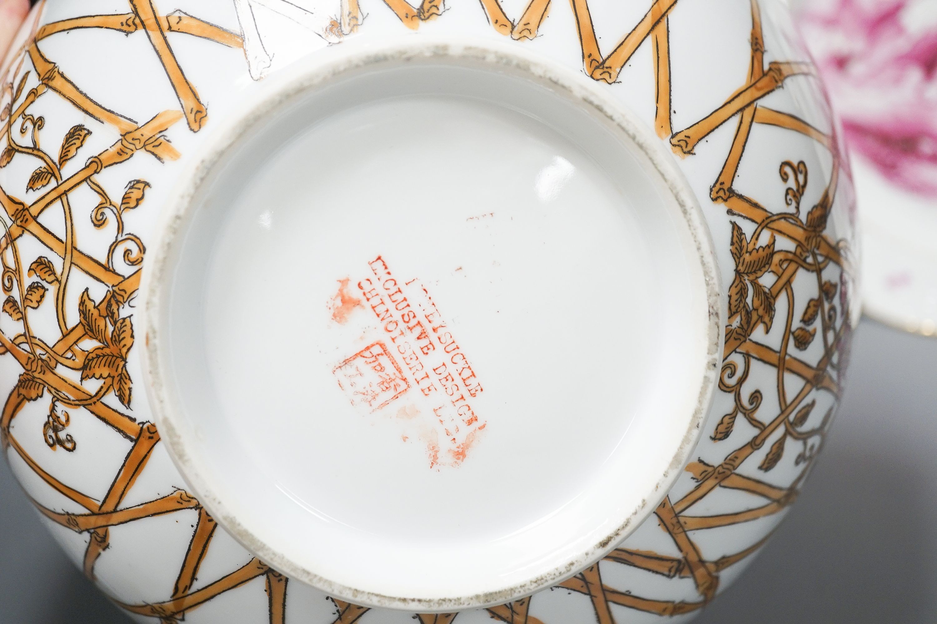 A Furstenburg dessert plate, later painted in puce, signed in reverse ‘W Munscher Stuttgart 1875’, 14.75cm an early 19th century Derby vase and a chinoiserie porcelain bowl (3)